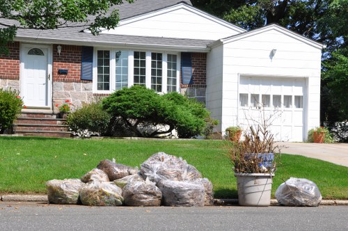 Clutter-free living room being cleared by professionals
